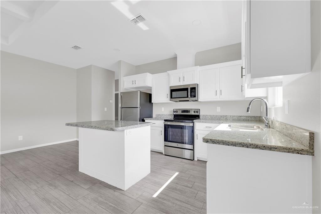 Photo 4 of 5105 Dahlia Street #3